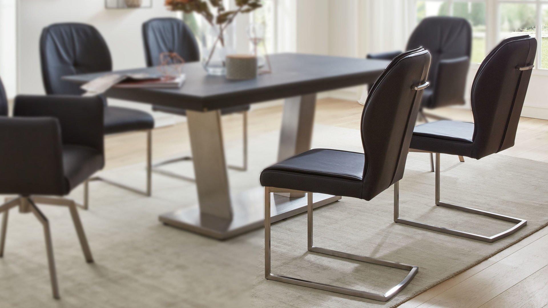 Schwingstuhl Mwa | il aus Leder in Schwarz Interliving Esszimmer Serie 5104 – Schwingstuhl schwarzes Leder Raven & Edelstahlgestell