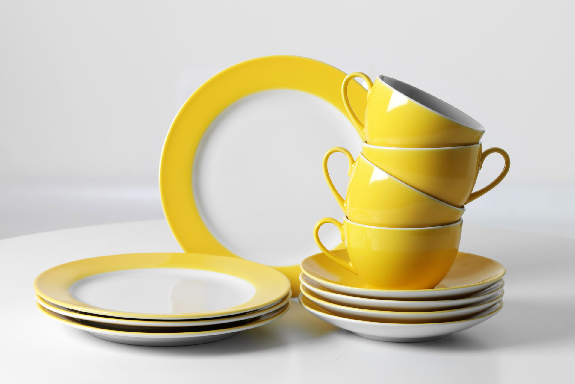 Kaffeeservice Ritzenhoff & breker aus Porzellan in Gelb Ritzenhoff & Breker Kaffeeservice Doppio weißes Porzellan mit gelbem Rand - zwölfteilig, Kaffeegeschirr