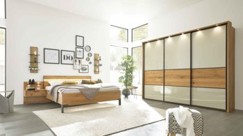 Möbelbeleuchtung Interliving aus Holz in Hellgrau Interliving Schlafzimmer Serie 1027 – Komplettzimmer 001 mit Paneelen und Licht Eiche bianco & Champagner - Liegefläche ca. 180 x 200 cm