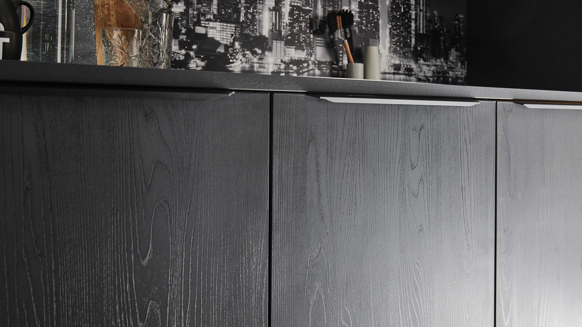 Einbauküche Nolte® küchen aus Holz in Schwarz nolte® Einbauküche Manhattan mit AEG Einbaugeräten Eiche Nero – dreizeilig