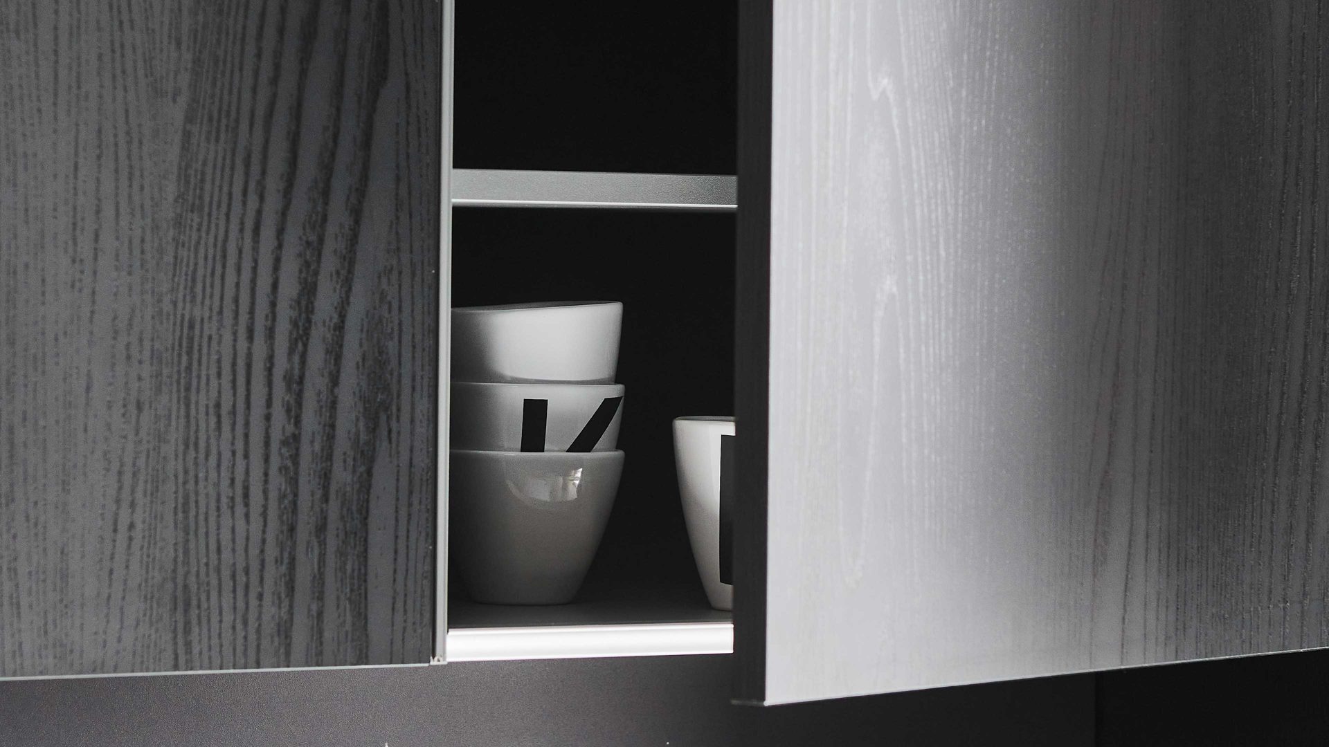 Einbauküche Nolte® küchen aus Holz in Schwarz nolte® Einbauküche Manhattan mit AEG Einbaugeräten Eiche Nero – dreizeilig