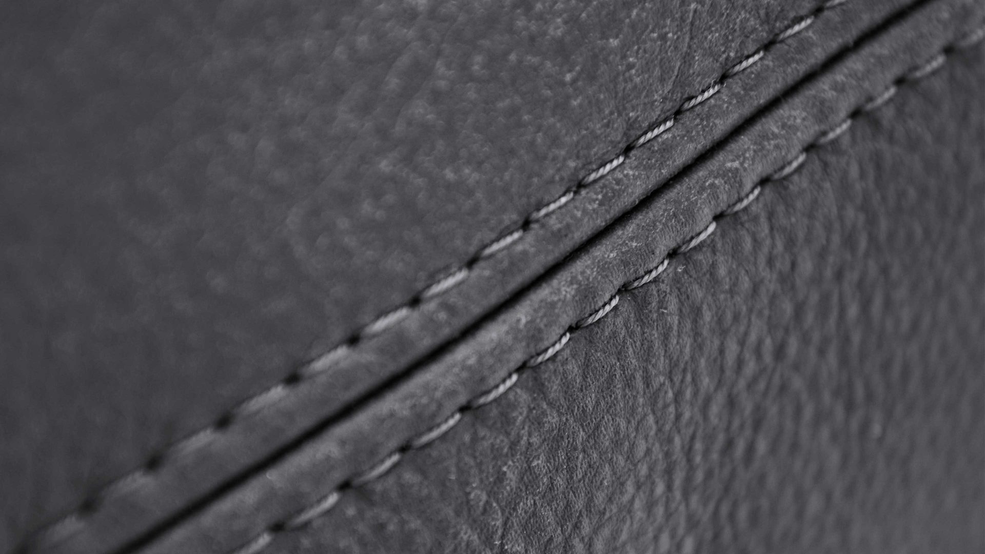 Polsterhocker SOFAkultur aus Leder in Anthrazit SOFAkultur Programm SK 760 - XL-Hocker anthrazitfarbenes Leder Movini - ca. 100 x 100 cm