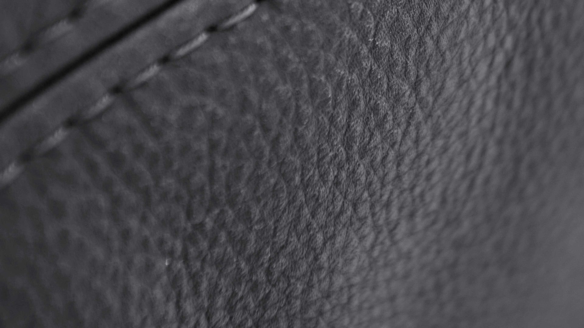 Polsterhocker SOFAkultur aus Leder in Anthrazit SOFAkultur Programm SK 760 - XL-Hocker anthrazitfarbenes Leder Movini - ca. 100 x 100 cm