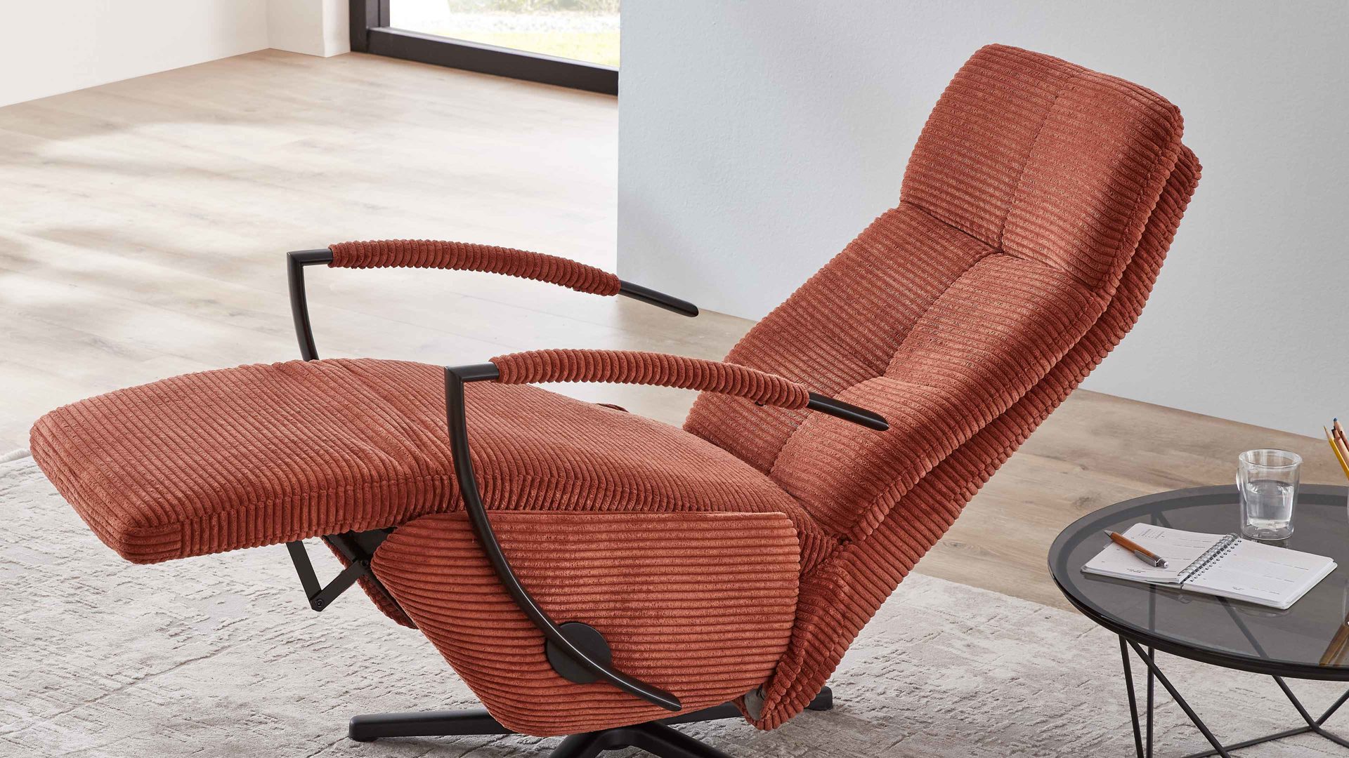 Relaxsessel KAWOO aus Stoff in Orange KAWOO Polstermöbel Santa Rosa - Relaxsessel kupferfarbener Breitcord Lincoln & mattschwarzer Sternfuss