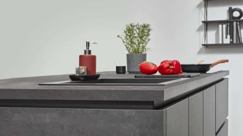 Einbauküche Nobilia® aus Holz in Schwarz nobilia® Einbauküche Laser mit zwei Backöfen Schwarzbeton - zweizeilig