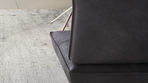 Polsterbank Koinor aus Leder in Schwarz KOINOR Dining System - Polsterbank krähenfarbenes Leder Classic, Wildeiche & Edelstahl - Länge ca. 214 cm