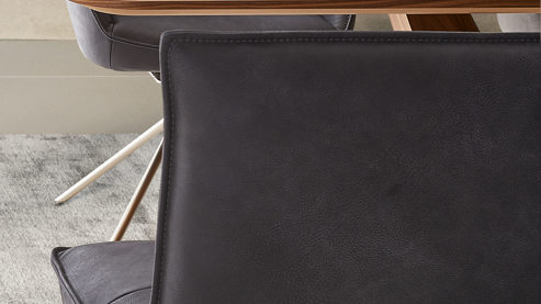 Polsterbank Koinor aus Leder in Schwarz KOINOR Dining System - Polsterbank krähenfarbenes Leder Classic, Wildeiche & Edelstahl - Länge ca. 214 cm