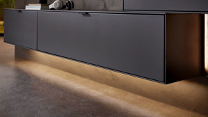 Lowboard Wöstmann markenmöbel aus Holz in Dunkelgrau WÖSTMANN Wohnprogramm WM 2470 - Hängeelement graphitgrauer Lack - ein Auszug, eine Klapptür, Breite ca. 212 cm