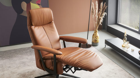 Relaxsessel Himolla aus Leder in Braun himolla Relaxsessel Serie 7387 - Easyswing 36V nussfarbenes LongLife-Leder 18 & anthrazitfarbener Sternfuß