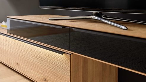 Lowboard Interliving aus Holz in Holzfarben Interliving Wohnzimmer Serie 2033 - Lowboard 126815 dunkelgraues Glas & Asteiche - zwei Schubladen, Länge ca. 182 cm